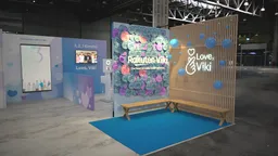 30x50 Island booth design by Reaction Space